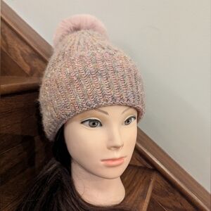 Norla Canada Pink multicoloured yarn cable knit beanie hat with faux fur pom pom